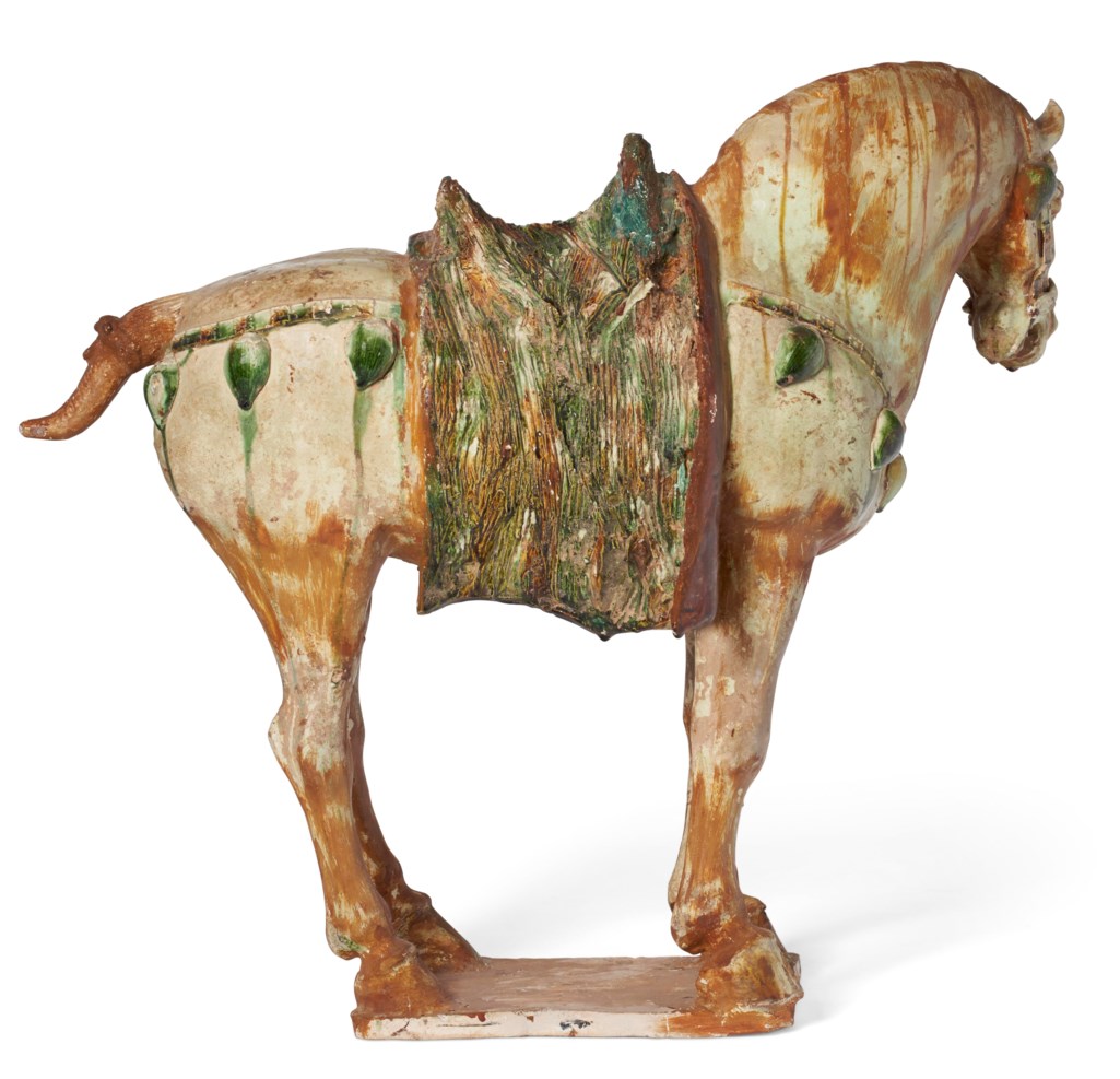 A SANCAIGLAZED POTTERY FIGURE OF A HORSE, TANG DYNASTY (AD 618907